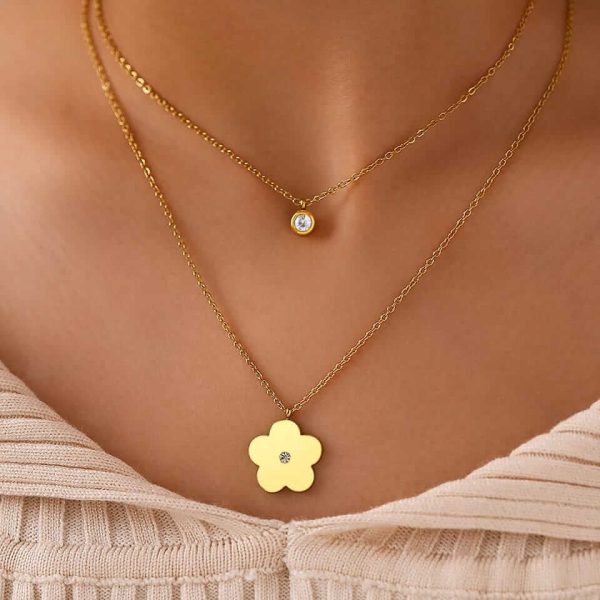 Flower crystal layered gold chain.
