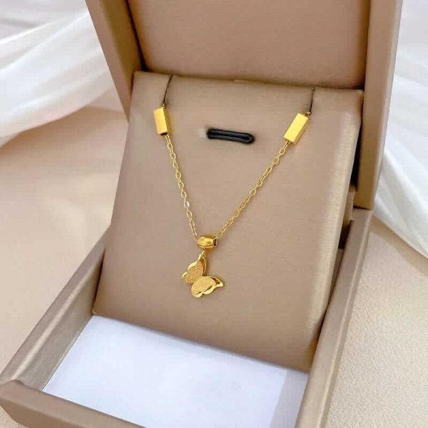 Butterfly pendant gold necklace.